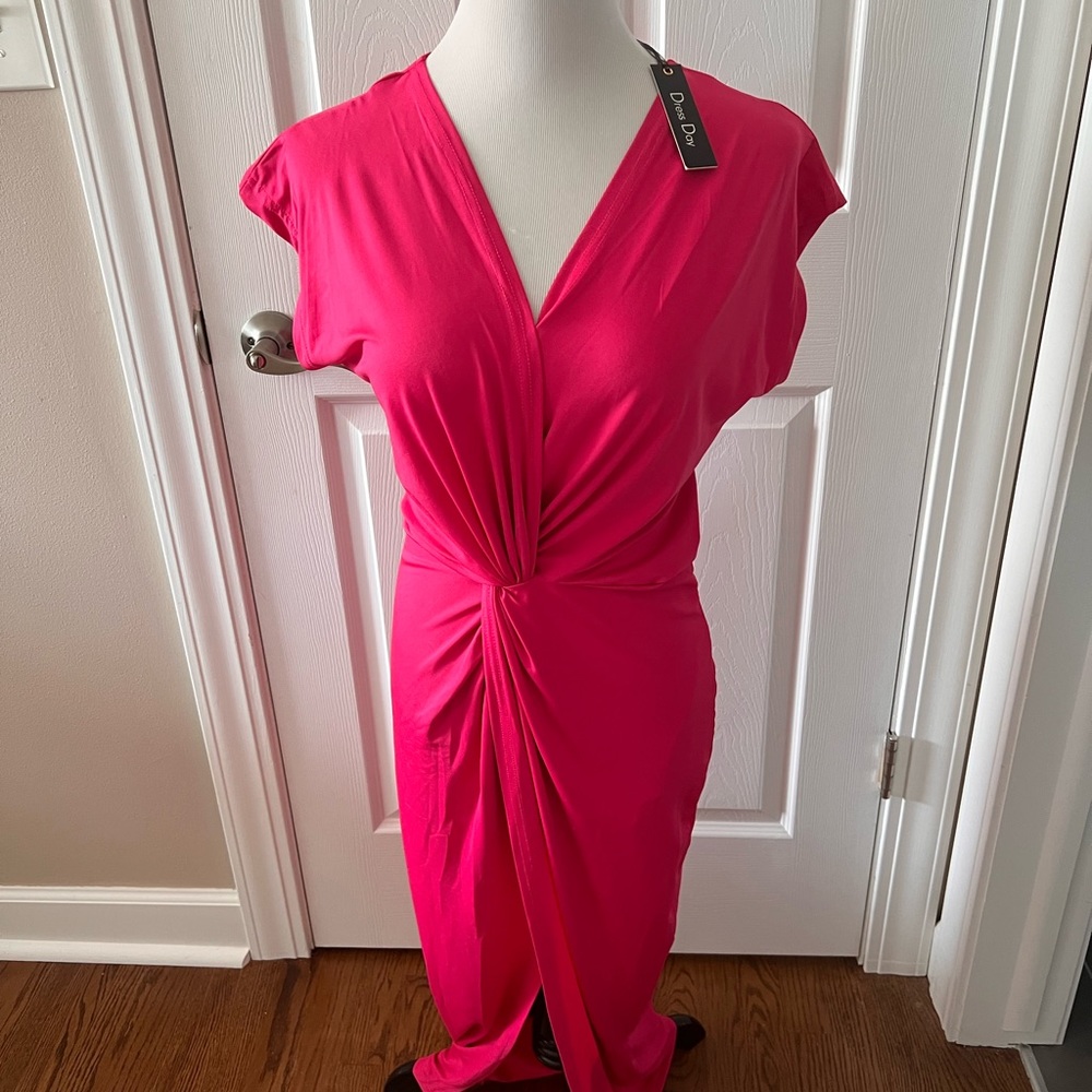 Bright pink body con dress
